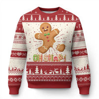 Red and cream knit Christmas sweater with gingerbread cookie graphic and festive pattern