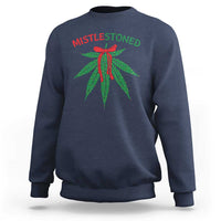 Navy crewneck sweatshirt with “MISTLESTONED” text and mistletoe leaves graphic