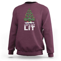 Maroon crewneck sweatshirt with colorful Christmas weed-tree graphic and “LET’S GET LIT” print