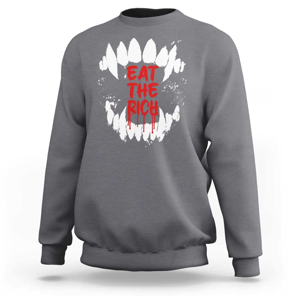Charcoal sweatshirt with white fang graphic and red “EAT THE RICH” text on back