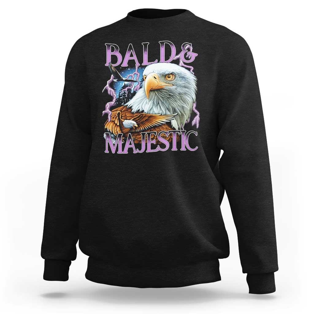 Black crewneck sweatshirt with colorful eagle graphic and “Bald & Majestic” text