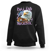 Black crewneck sweatshirt with colorful eagle graphic and “Bald & Majestic” text