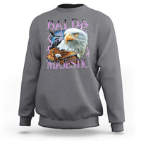 Charcoal crewneck sweatshirt with colorful eagle graphic and “Bald & Majestic” text
