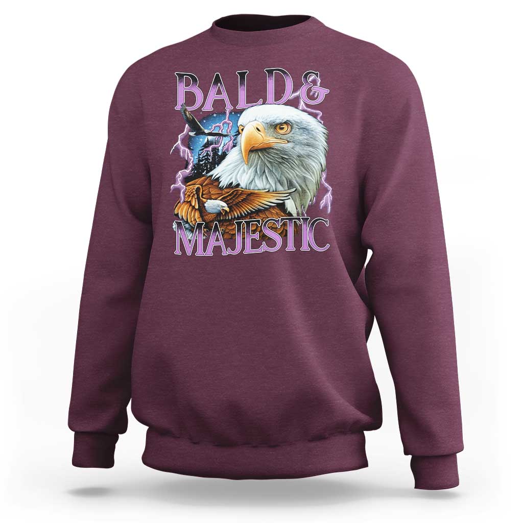 Maroon crewneck sweatshirt with colorful eagle graphic and “Bald & Majestic” text