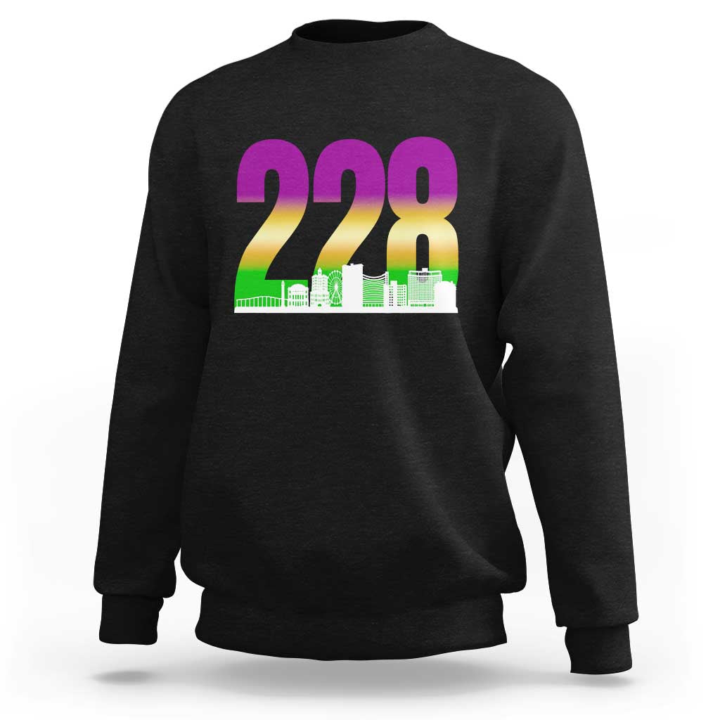 Black crewneck sweatshirt with 228 colorful graphic and green skyline print