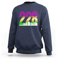 Navy crewneck sweatshirt with 228 colorful graphic and green skyline print