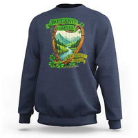Navy crewneck sweatshirt with 'IRELAND FOREVER' scenic landscape and clover print.