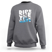Charcoal surfing sweatshirt with “Ride the Wave” graphic on the chest