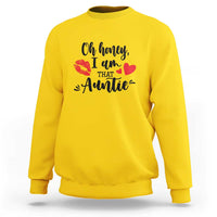 Daisy yellow aunt sweatshirt with lips, heart and "Oh honey I am that auntie" front graphic