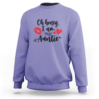 Violet aunt sweatshirt with lips, heart and "Oh honey I am that auntie" front graphic