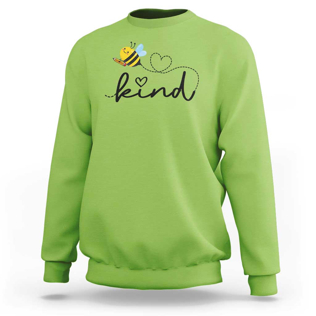 Lime green crewneck sweatshirt with bee and heart 'kind' graphic.