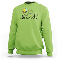 Lime green crewneck sweatshirt with bee and heart 'kind' graphic.