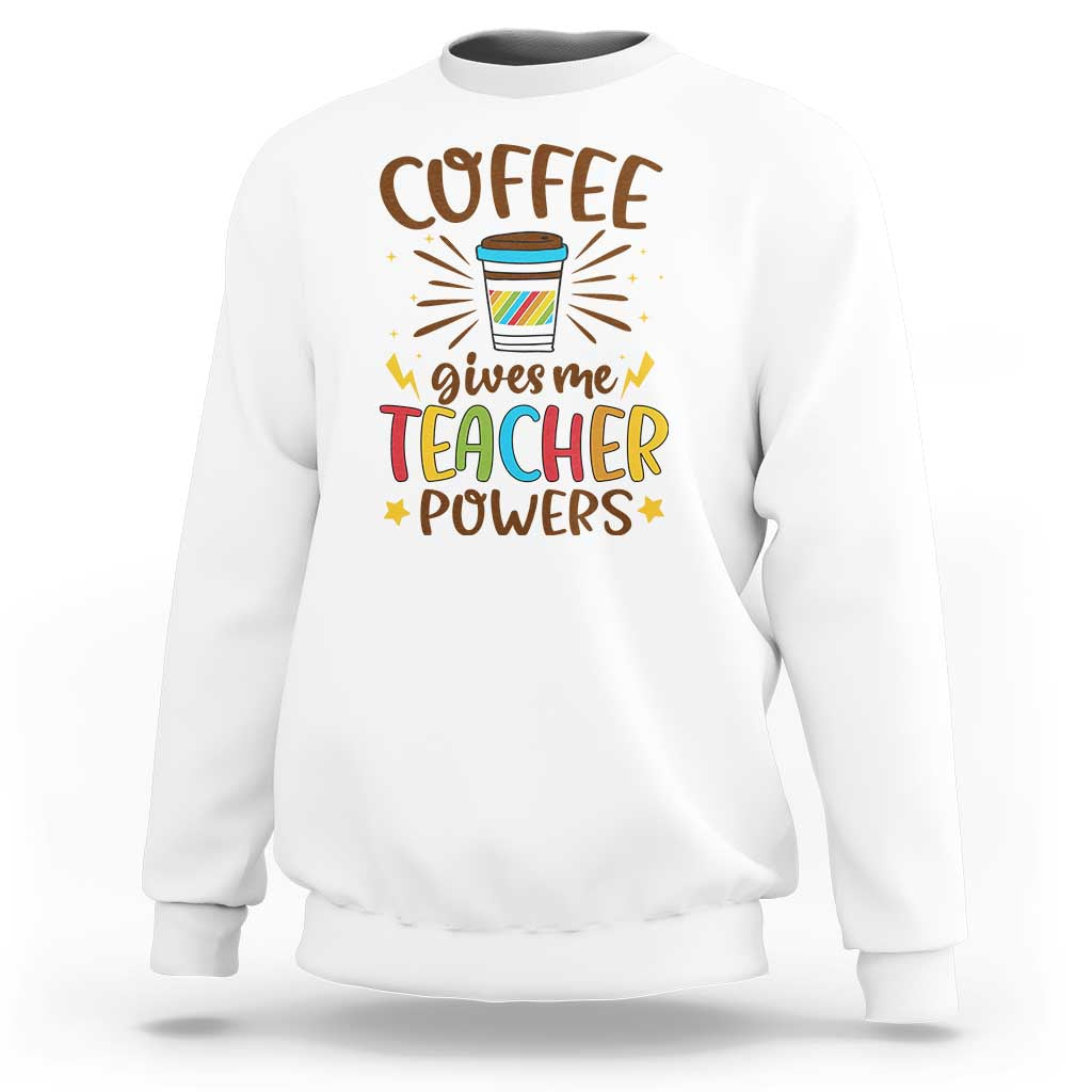 White sweatshirt with “Coffee gives me Teacher Powers” graphic on chest