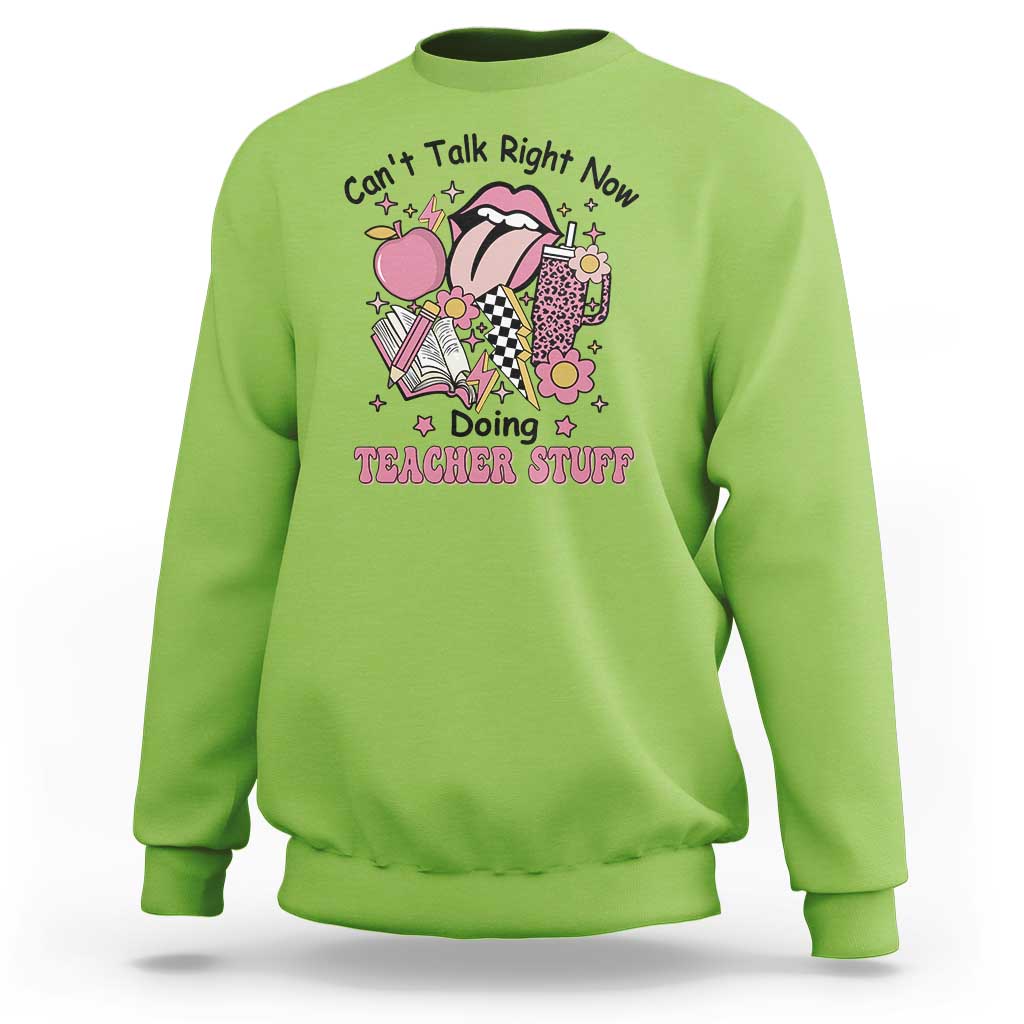 Lime green teachers sweatshirt with colorful cartoon graphic and text "Doing TEACHER STUFF"