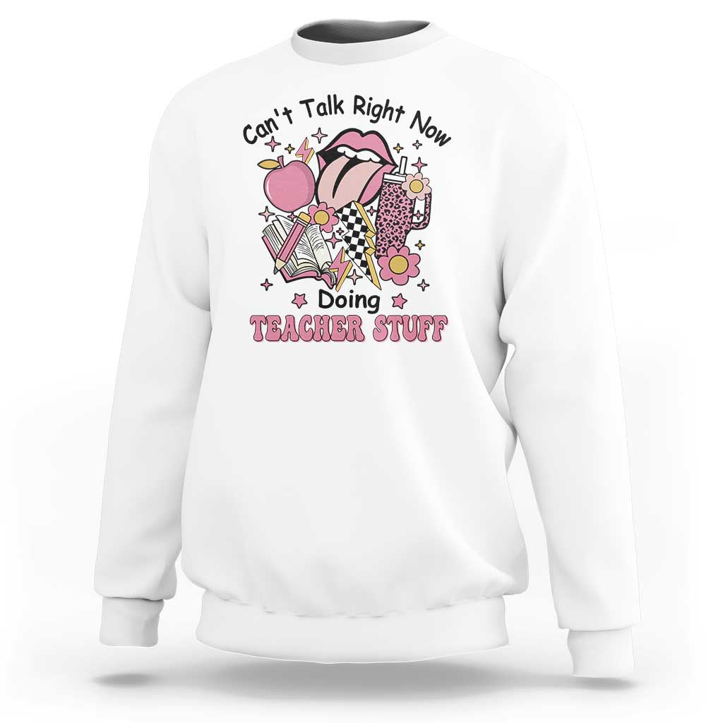 White teachers sweatshirt with colorful cartoon graphic and text "Doing TEACHER STUFF"