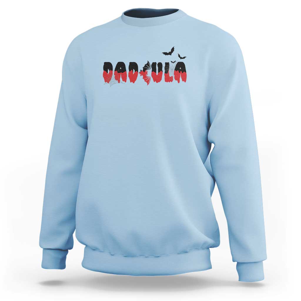Light blue Halloween crewneck sweatshirt with vampire bat graphic on chest