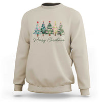 Sand crewneck sweatshirt with colorful Christmas tree graphic and “Merry Christmas” text