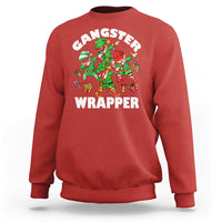 Red crewneck sweatshirt with colorful 'Gangster Wrapper' elf graphic