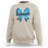 Sand Christmas sweatshirt with blue bow graphic and nativity scene front print