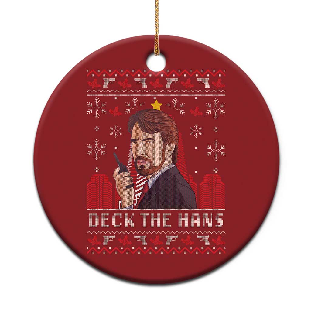 Red circular Christmas ornament with 'Deck the Hans' character graphic, hanging loop.