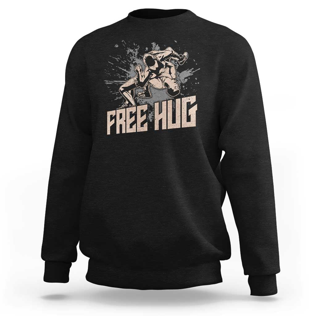 Black pullover sweatshirt with wrestler graphic and 'FREE HUG' front print
