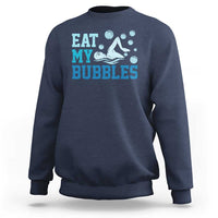 Navy crewneck sweatshirt with “EAT MY BUBBLES” bubble graphic print