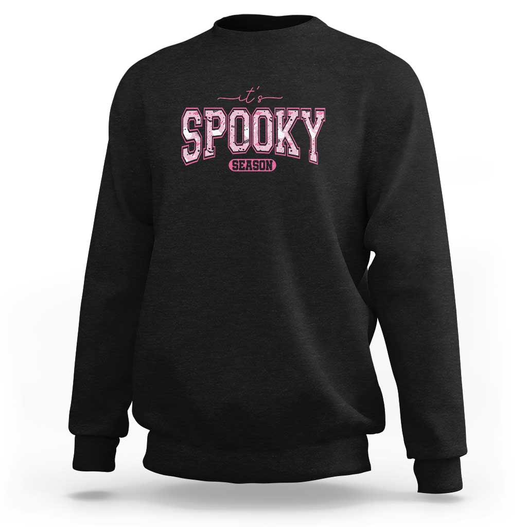 Halloween sweatshirt, black with “Spooky Season” graphic on the chest