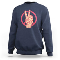 Royal blue crewneck sweatshirt with red peace-sign graphic and Harris 2024 text.