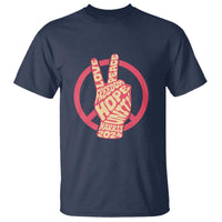Navy short-sleeve T-shirt with red peace-sign circle graphic and 'Harris 2024' text
