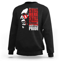 Black crewneck sweatshirt with Native-inspired profile graphic and red stacked text front
