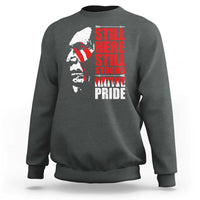 Charcoal gray crewneck sweatshirt with Native-inspired profile graphic and red stacked text front
