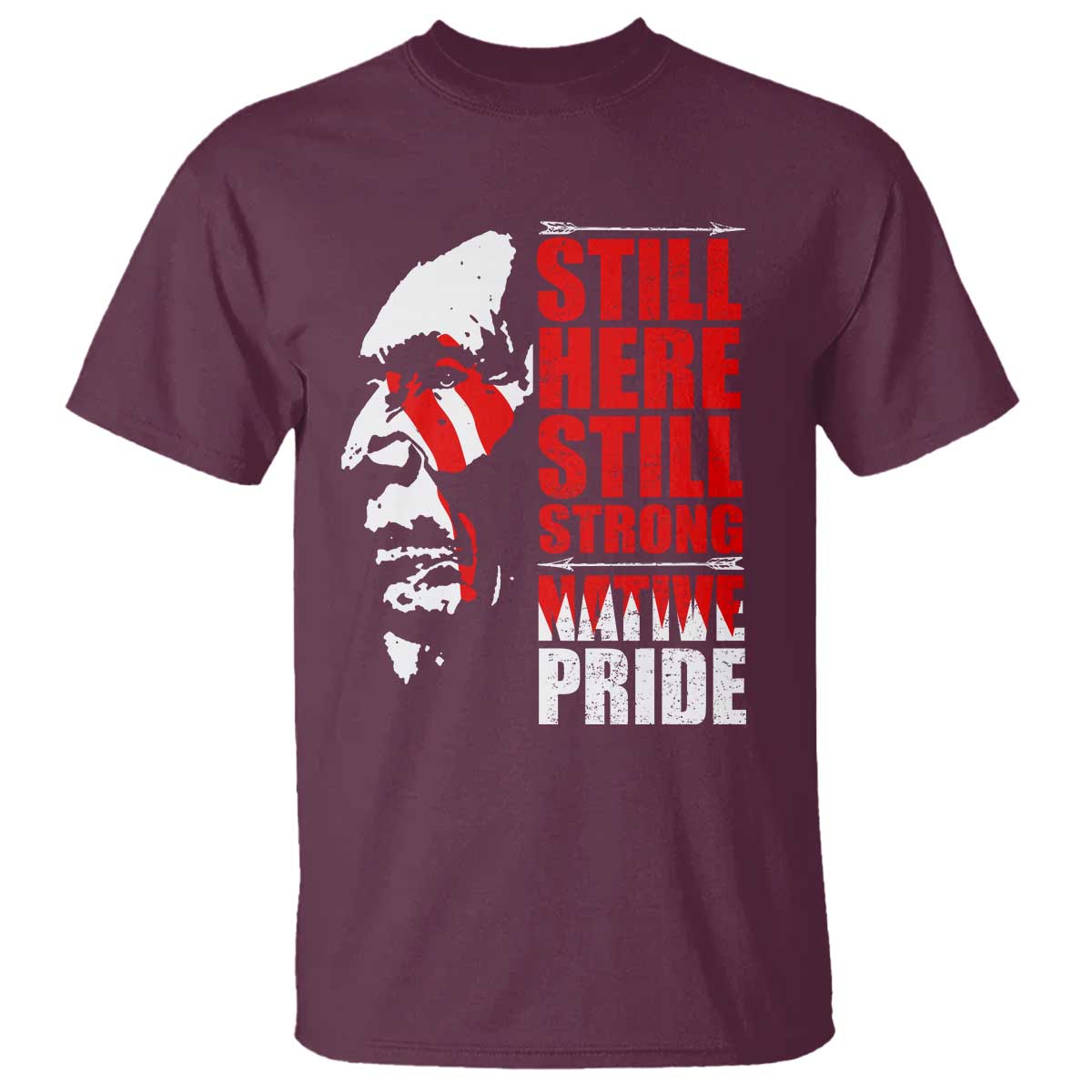 Maroon graphic T-shirt with Native pride poster-style front print: “STILL HERE”