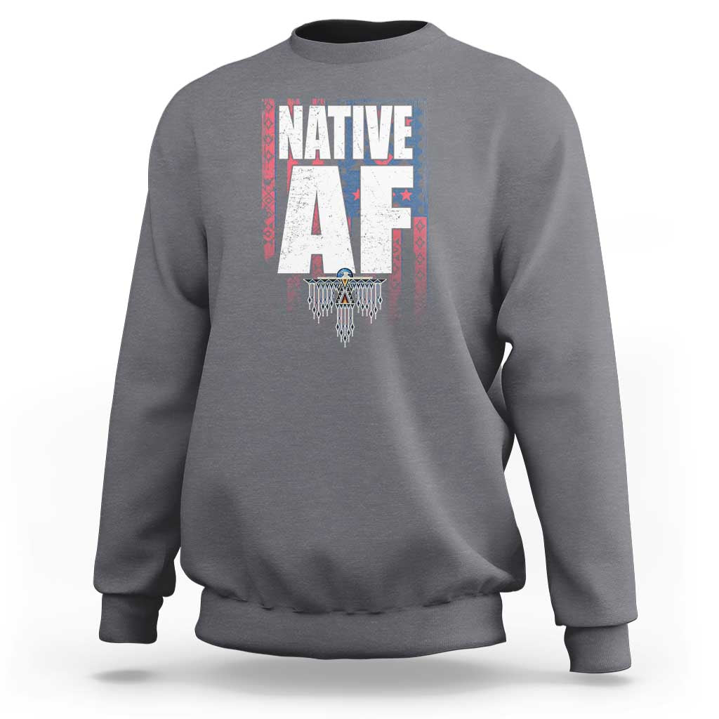 Heather gray crewneck sweatshirt with centered Native-inspired graphic print and ribbed cuffs