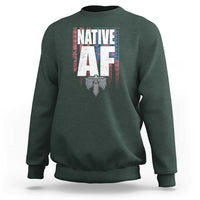 Dark green crewneck sweatshirt with centered Native-inspired graphic print and ribbed cuffs