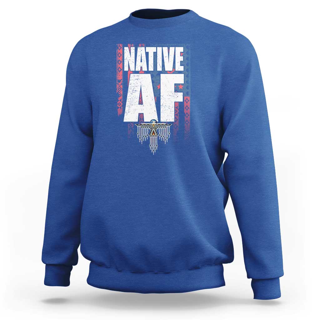 Royal blue crewneck sweatshirt with centered Native-inspired graphic print and ribbed cuffs