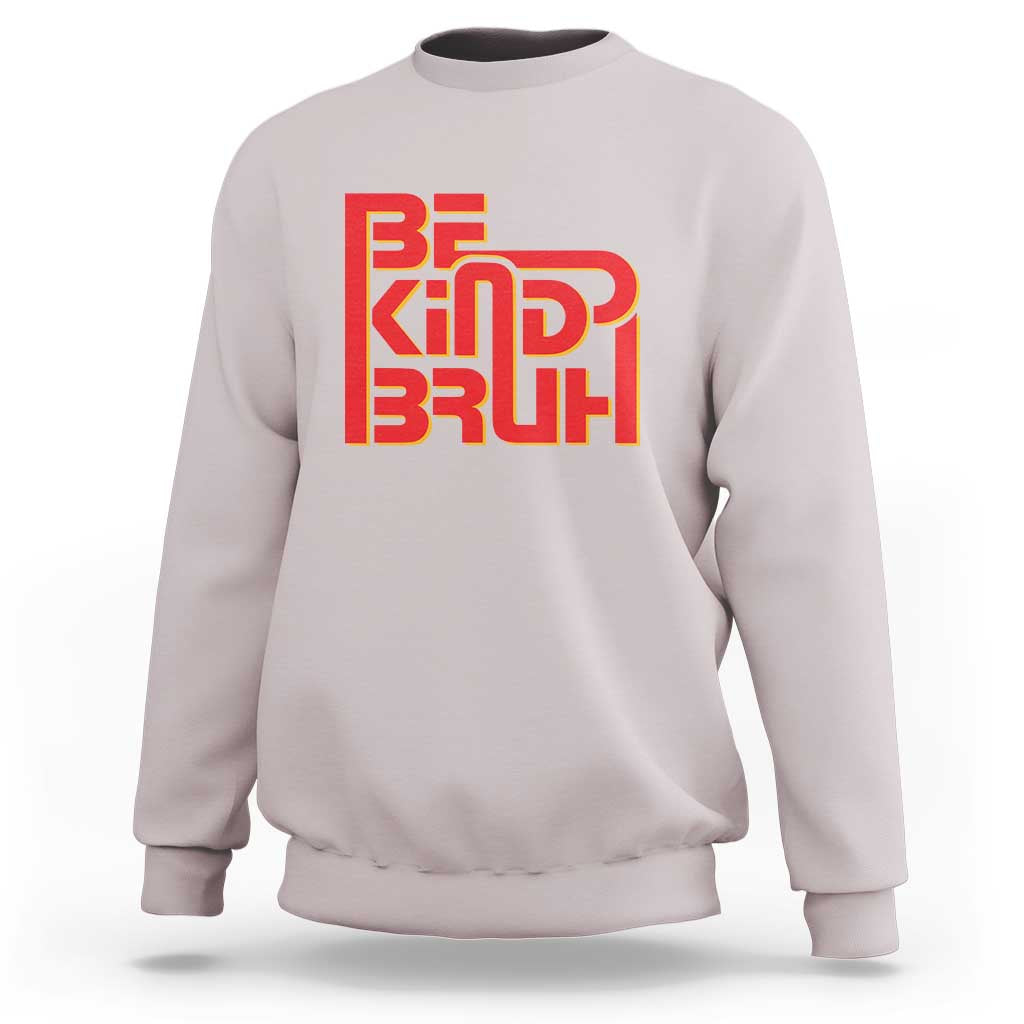 Light pink crewneck sweatshirt with 'BE KIND BRUH' graphic