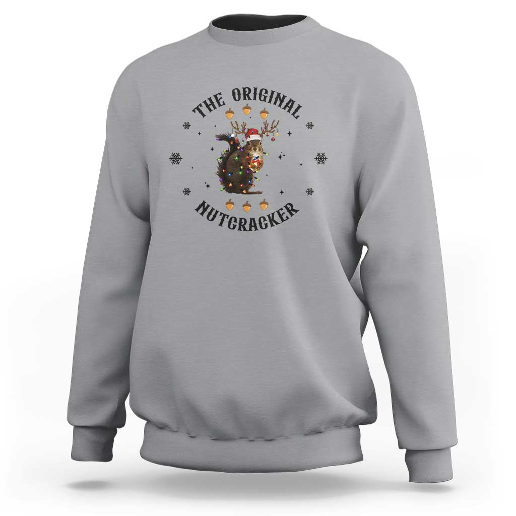 Ice gray crewneck sweatshirt with nutcracker graphic and winter snowflake accents