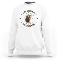 White crewneck sweatshirt with nutcracker graphic and winter snowflake accents