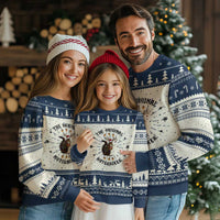 Navy Christmas sweater with nutcracker artwork, snowflake trees, and fair isle trim