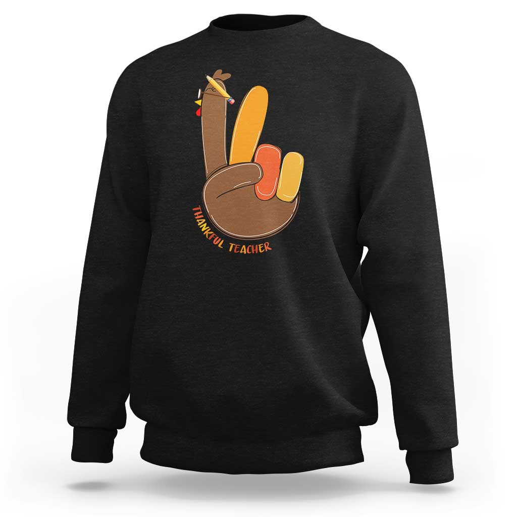 Thankful teacher sweatshirt, black, with turkey-and-pencil graphic on front