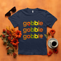 Navy funny Thanksgiving t-shirt with “gobble gobble” text and turkey graphic
