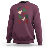 Maroon crewneck sweatshirt with multicolor 'Fa La La' holiday graphic