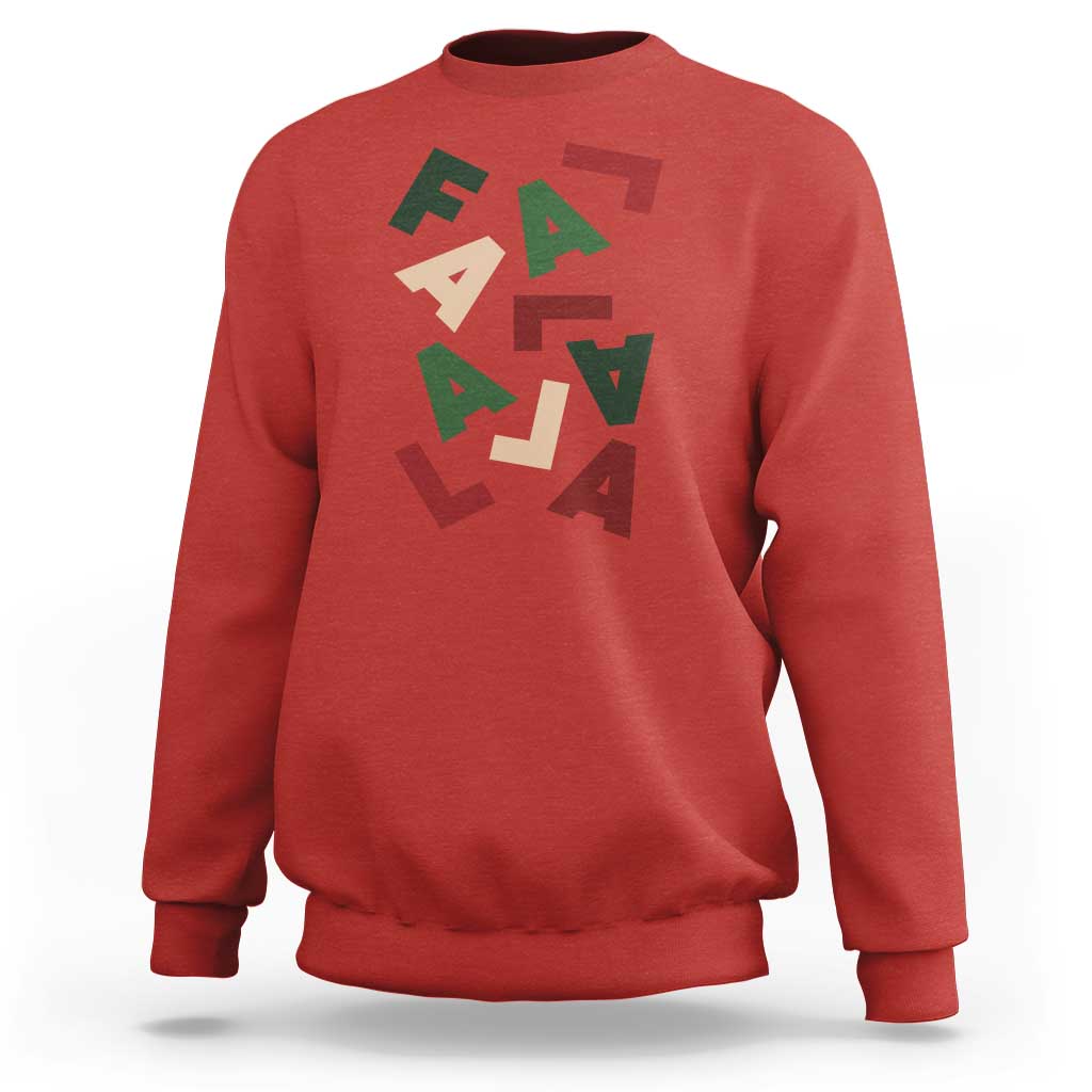 Red crewneck sweatshirt with multicolor 'Fa La La' holiday graphic