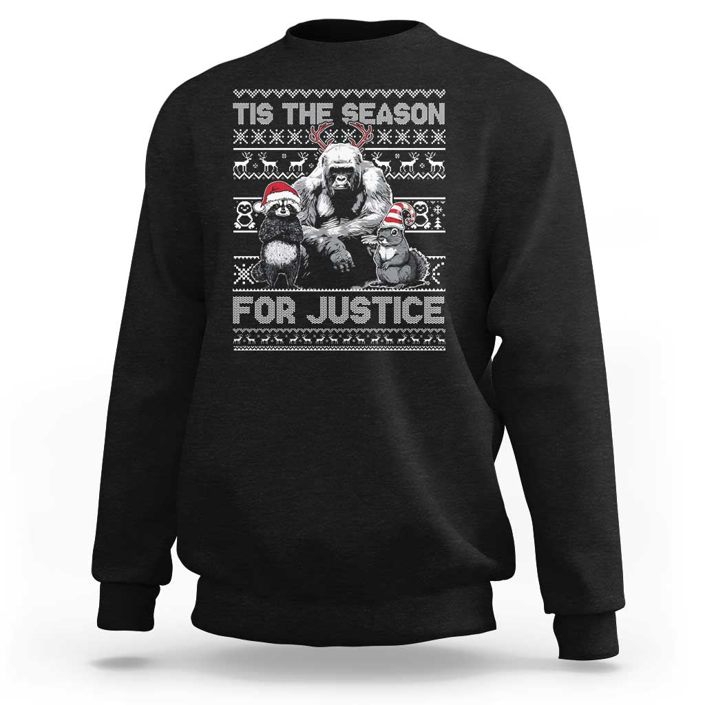 Black crewneck sweatshirt with “Tis the Season for Justice” graphic and long sleeves