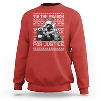 Red crewneck sweatshirt with “Tis the Season for Justice” graphic and long sleeves