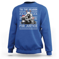 Royal blue crewneck sweatshirt with “Tis the Season for Justice” graphic and long sleeves