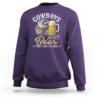 Purple crewneck sweatshirt with Cowboys and Beer graphic and “That’s Why I’m Here” lettering