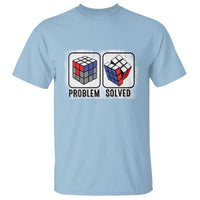 Light blue puzzle cube T-shirt with 'Problem solved' chest graphic.