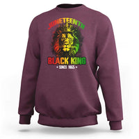 Maroon crewneck sweatshirt with colorful lion and Juneteenth Black King graphic