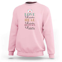 Pastel pink crewneck sweatshirt with 'Love heal return them' nurse heart graphic